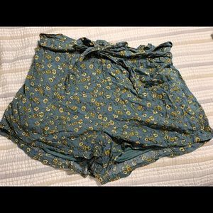 Green floral shorts